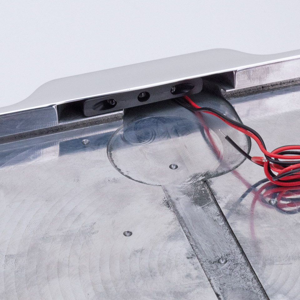 LICENSE PLATE FRAME WITH LICENSE PLATE ILLUMINATION